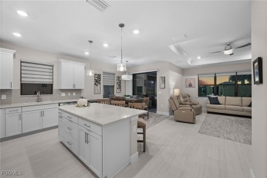 Why wait to build when you can have nearly new? This light and on River Hall Country Club in Florida - for sale on GolfHomes.com, golf home, golf lot