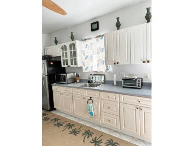 Located in an exclusive gated community with a championship on The Great Outdoors Golf and Country Club in Florida - for sale on GolfHomes.com, golf home, golf lot