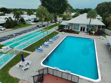 Welcome home to comfort, sunshine, and easy living in on Leisureville Community Association in Florida - for sale on GolfHomes.com, golf home, golf lot