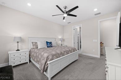 Why wait to build when you can have nearly new? This light and on River Hall Country Club in Florida - for sale on GolfHomes.com, golf home, golf lot