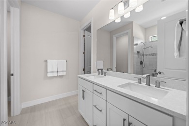Why wait to build when you can have nearly new? This light and on River Hall Country Club in Florida - for sale on GolfHomes.com, golf home, golf lot