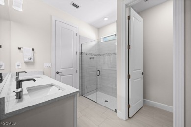 Why wait to build when you can have nearly new? This light and on River Hall Country Club in Florida - for sale on GolfHomes.com, golf home, golf lot