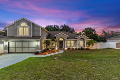 Step into refined Florida living with this beautifully upgraded on Spring Hill Golf Course in Florida - for sale on GolfHomes.com, golf home, golf lot