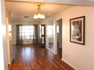 This well-maintained Baldwin floor plan offers 1,094 sq. ft. of on Mainlands Golf Club in Florida - for sale on GolfHomes.com, golf home, golf lot