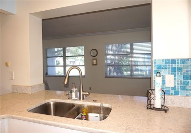 This well-maintained Baldwin floor plan offers 1,094 sq. ft. of on Mainlands Golf Club in Florida - for sale on GolfHomes.com, golf home, golf lot