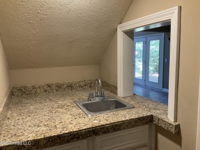 A home with a view! Welcome home to this 3 bedroom, 2 bath home on Colonial Country Club Deerfield in Mississippi - for sale on GolfHomes.com, golf home, golf lot