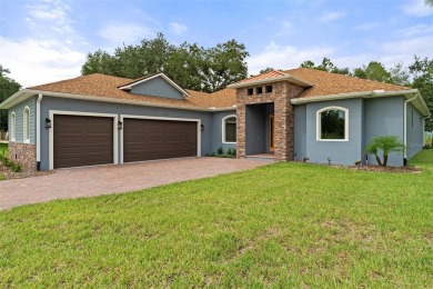 Don't miss your chance to own this exquisite, custom-built new on Harmony Golf Preserve in Florida - for sale on GolfHomes.com, golf home, golf lot