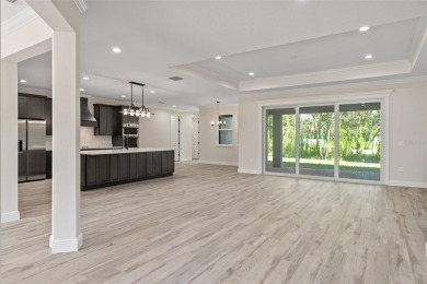 Don't miss your chance to own this exquisite, custom-built new on Harmony Golf Preserve in Florida - for sale on GolfHomes.com, golf home, golf lot