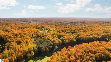 Magnificent, breathtaking, spectacular  take your pick -this Up on Cedar River Golf Course in Michigan - for sale on GolfHomes.com, golf home, golf lot