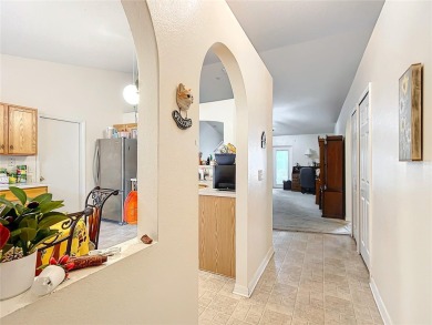 Welcome to this charming 3 bedroom, 2 bath, 2 car garage home on Citrus Springs Country Club in Florida - for sale on GolfHomes.com, golf home, golf lot