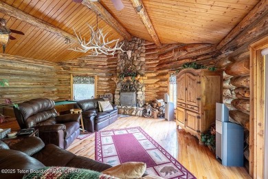 Experience the charm of rustic elegance at 590 Walnut Drive on Star Valley RV Golf Course in Wyoming - for sale on GolfHomes.com, golf home, golf lot