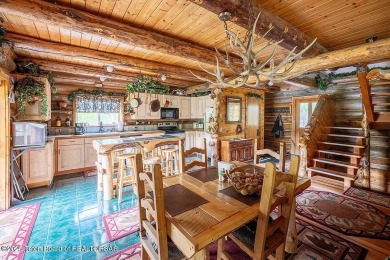 Experience the charm of rustic elegance at 590 Walnut Drive on Star Valley RV Golf Course in Wyoming - for sale on GolfHomes.com, golf home, golf lot