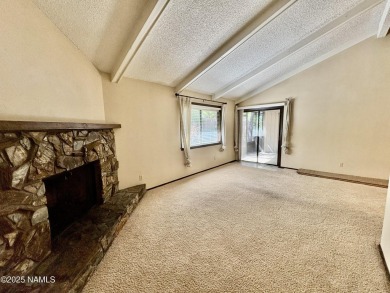 Discover a peaceful single-level home steps away from the golf on Aspen Valley Golf Club in Arizona - for sale on GolfHomes.com, golf home, golf lot