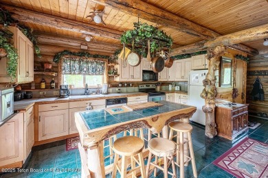 Experience the charm of rustic elegance at 590 Walnut Drive on Star Valley RV Golf Course in Wyoming - for sale on GolfHomes.com, golf home, golf lot