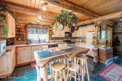 Experience the charm of rustic elegance at 590 Walnut Drive on Star Valley RV Golf Course in Wyoming - for sale on GolfHomes.com, golf home, golf lot