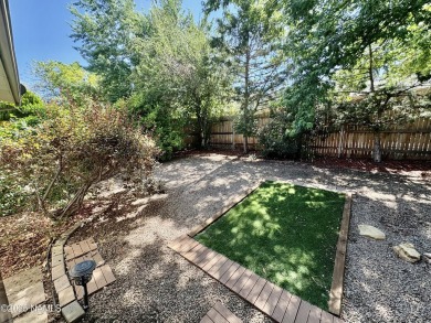 Discover a peaceful single-level home steps away from the golf on Aspen Valley Golf Club in Arizona - for sale on GolfHomes.com, golf home, golf lot