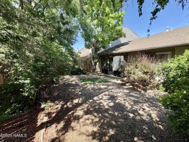 Discover a peaceful single-level home steps away from the golf on Aspen Valley Golf Club in Arizona - for sale on GolfHomes.com, golf home, golf lot
