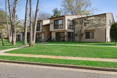 Welcome to this charming 2-bedroom, 1-bath lower-level condo in on Pine Brook Golf Course in New Jersey - for sale on GolfHomes.com, golf home, golf lot