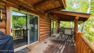Experience the charm of rustic elegance at 590 Walnut Drive on Star Valley RV Golf Course in Wyoming - for sale on GolfHomes.com, golf home, golf lot