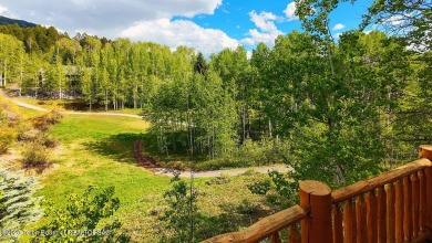 Experience the charm of rustic elegance at 590 Walnut Drive on Star Valley RV Golf Course in Wyoming - for sale on GolfHomes.com, golf home, golf lot