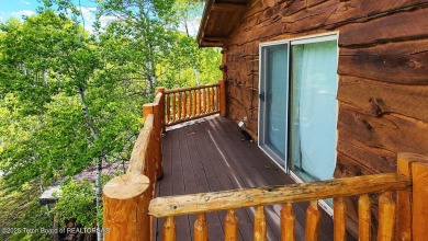 Experience the charm of rustic elegance at 590 Walnut Drive on Star Valley RV Golf Course in Wyoming - for sale on GolfHomes.com, golf home, golf lot
