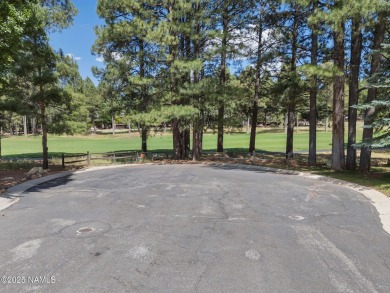 Discover a peaceful single-level home steps away from the golf on Aspen Valley Golf Club in Arizona - for sale on GolfHomes.com, golf home, golf lot