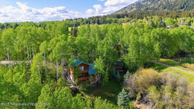 Experience the charm of rustic elegance at 590 Walnut Drive on Star Valley RV Golf Course in Wyoming - for sale on GolfHomes.com, golf home, golf lot