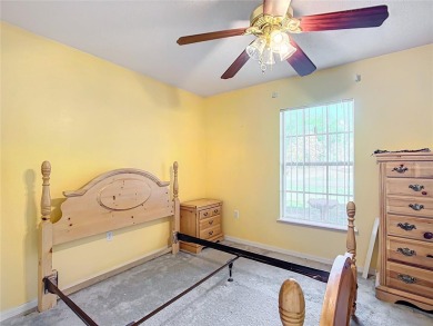 Welcome to this charming 3 bedroom, 2 bath, 2 car garage home on Citrus Springs Country Club in Florida - for sale on GolfHomes.com, golf home, golf lot