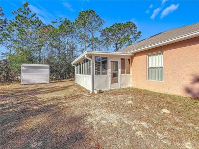 Welcome to this charming 3 bedroom, 2 bath, 2 car garage home on Citrus Springs Country Club in Florida - for sale on GolfHomes.com, golf home, golf lot
