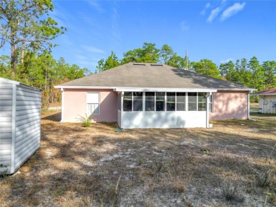 Welcome to this charming 3 bedroom, 2 bath, 2 car garage home on Citrus Springs Country Club in Florida - for sale on GolfHomes.com, golf home, golf lot