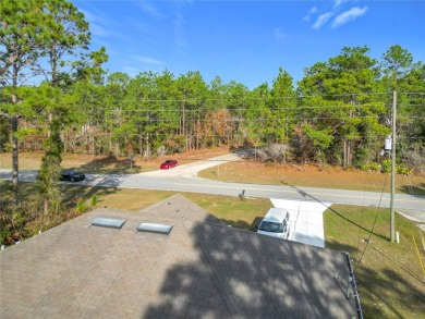 Welcome to this charming 3 bedroom, 2 bath, 2 car garage home on Citrus Springs Country Club in Florida - for sale on GolfHomes.com, golf home, golf lot