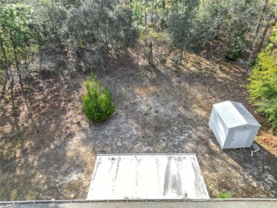 Welcome to this charming 3 bedroom, 2 bath, 2 car garage home on Citrus Springs Country Club in Florida - for sale on GolfHomes.com, golf home, golf lot