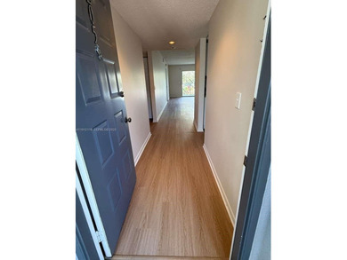 c Located on the 2nd floor of an elevator building, this unit on Flamingo Lakes Country Club in Florida - for sale on GolfHomes.com, golf home, golf lot