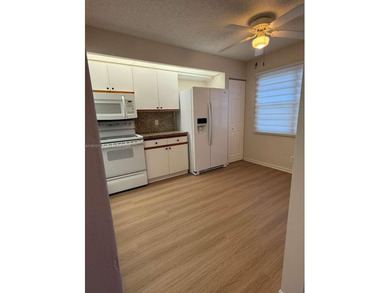 c Located on the 2nd floor of an elevator building, this unit on Flamingo Lakes Country Club in Florida - for sale on GolfHomes.com, golf home, golf lot