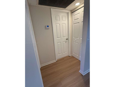 c Located on the 2nd floor of an elevator building, this unit on Flamingo Lakes Country Club in Florida - for sale on GolfHomes.com, golf home, golf lot