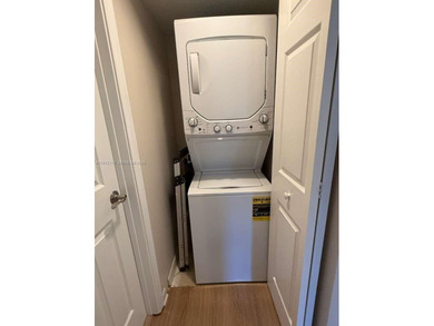 c Located on the 2nd floor of an elevator building, this unit on Flamingo Lakes Country Club in Florida - for sale on GolfHomes.com, golf home, golf lot