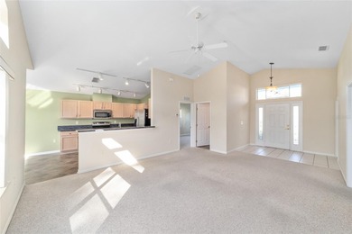 This rare Ocala model on a fully maintained lot lets you spend on Royal Oaks Golf Club in Florida - for sale on GolfHomes.com, golf home, golf lot