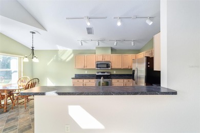 This rare Ocala model on a fully maintained lot lets you spend on Royal Oaks Golf Club in Florida - for sale on GolfHomes.com, golf home, golf lot