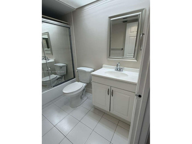 c Located on the 2nd floor of an elevator building, this unit on Flamingo Lakes Country Club in Florida - for sale on GolfHomes.com, golf home, golf lot