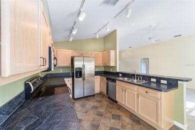 This rare Ocala model on a fully maintained lot lets you spend on Royal Oaks Golf Club in Florida - for sale on GolfHomes.com, golf home, golf lot