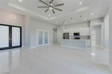 Discover the perfect blend of comfort, style, and location in on Burnt Store Golf Club in Florida - for sale on GolfHomes.com, golf home, golf lot