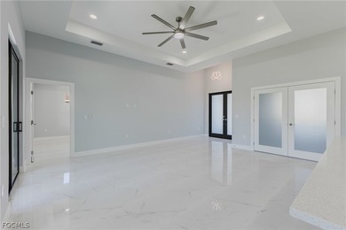 Discover the perfect blend of comfort, style, and location in on Burnt Store Golf Club in Florida - for sale on GolfHomes.com, golf home, golf lot