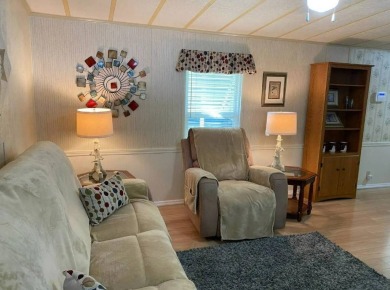 Welcome Home! This well-maintained home offers a great open on Golden Lakes Golf Course in Florida - for sale on GolfHomes.com, golf home, golf lot