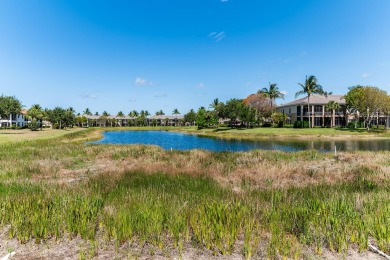 Beautifully furnished, turnkey, second-floor coach home with on The Golf Club At Fiddlers Creek in Florida - for sale on GolfHomes.com, golf home, golf lot
