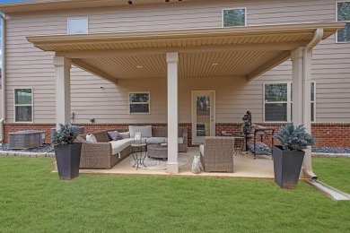Welcome home to 8033 Louis Drive! A meticulously cared for on Canongate At Heron Bay in Georgia - for sale on GolfHomes.com, golf home, golf lot