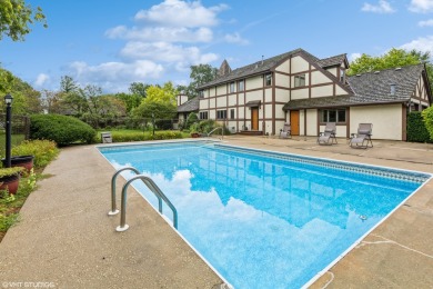 This unique custom-built Tudor-style home offers stunning views on Wedgewood Golf Course in Illinois - for sale on GolfHomes.com, golf home, golf lot