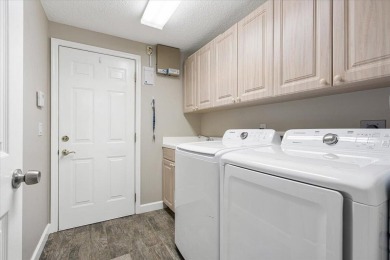 Fabulous Re-done Pool home in PGA Village with beautiful golf on The Legacy Golf and Tennis Club in Florida - for sale on GolfHomes.com, golf home, golf lot
