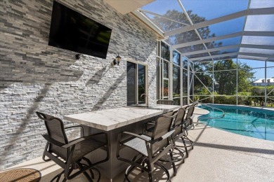 Fabulous Re-done Pool home in PGA Village with beautiful golf on The Legacy Golf and Tennis Club in Florida - for sale on GolfHomes.com, golf home, golf lot