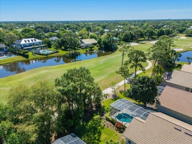 Fabulous Re-done Pool home in PGA Village with beautiful golf on The Legacy Golf and Tennis Club in Florida - for sale on GolfHomes.com, golf home, golf lot