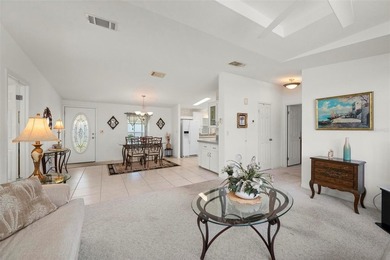 Beautifully maintained and fully furnished 2-bedroom, 2-bath on Kings Gate Golf Club in Florida - for sale on GolfHomes.com, golf home, golf lot